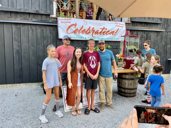 Family posing for a photo during a celebration