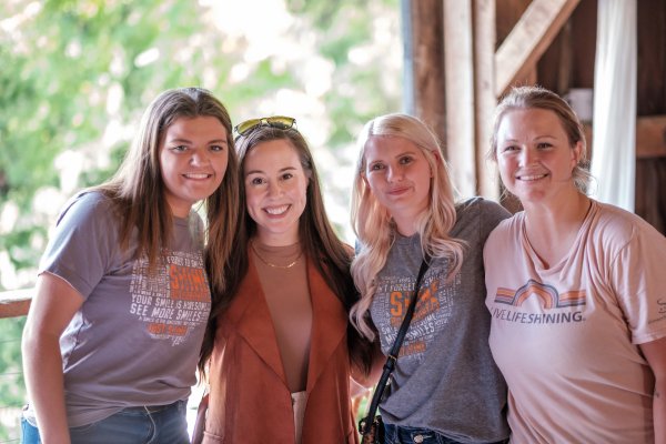 A group of women smiling 